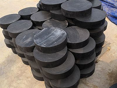 新民市板式橡胶支座由若干层橡胶片与薄钢板经加压硫化